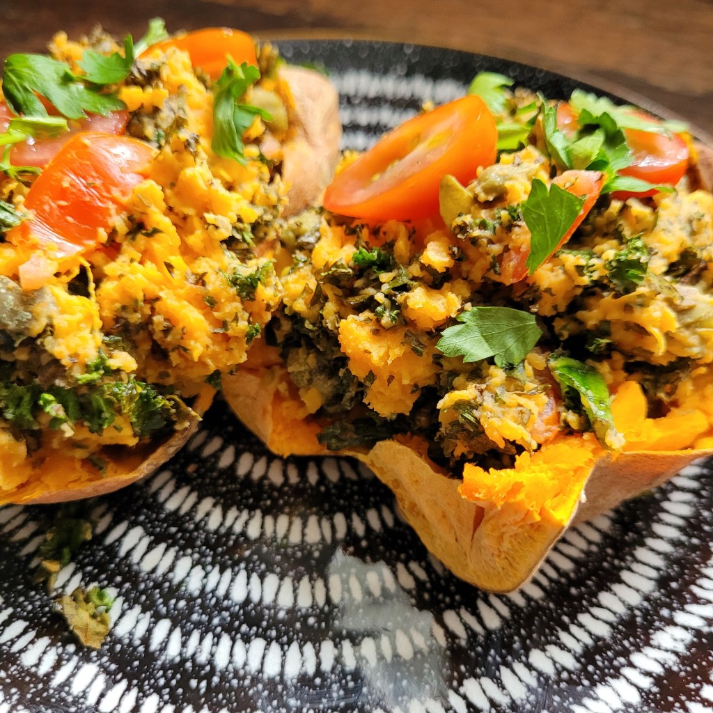 baked sweet potato with tahini and kale