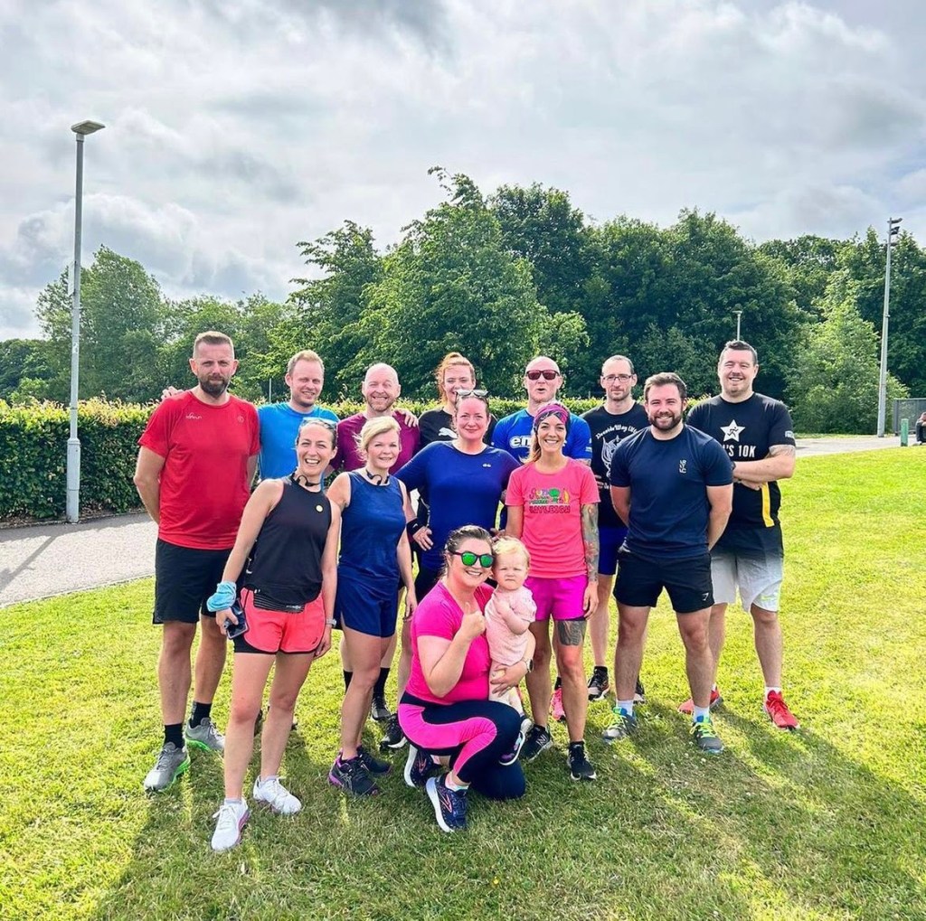 A group picture of runners at parkrun