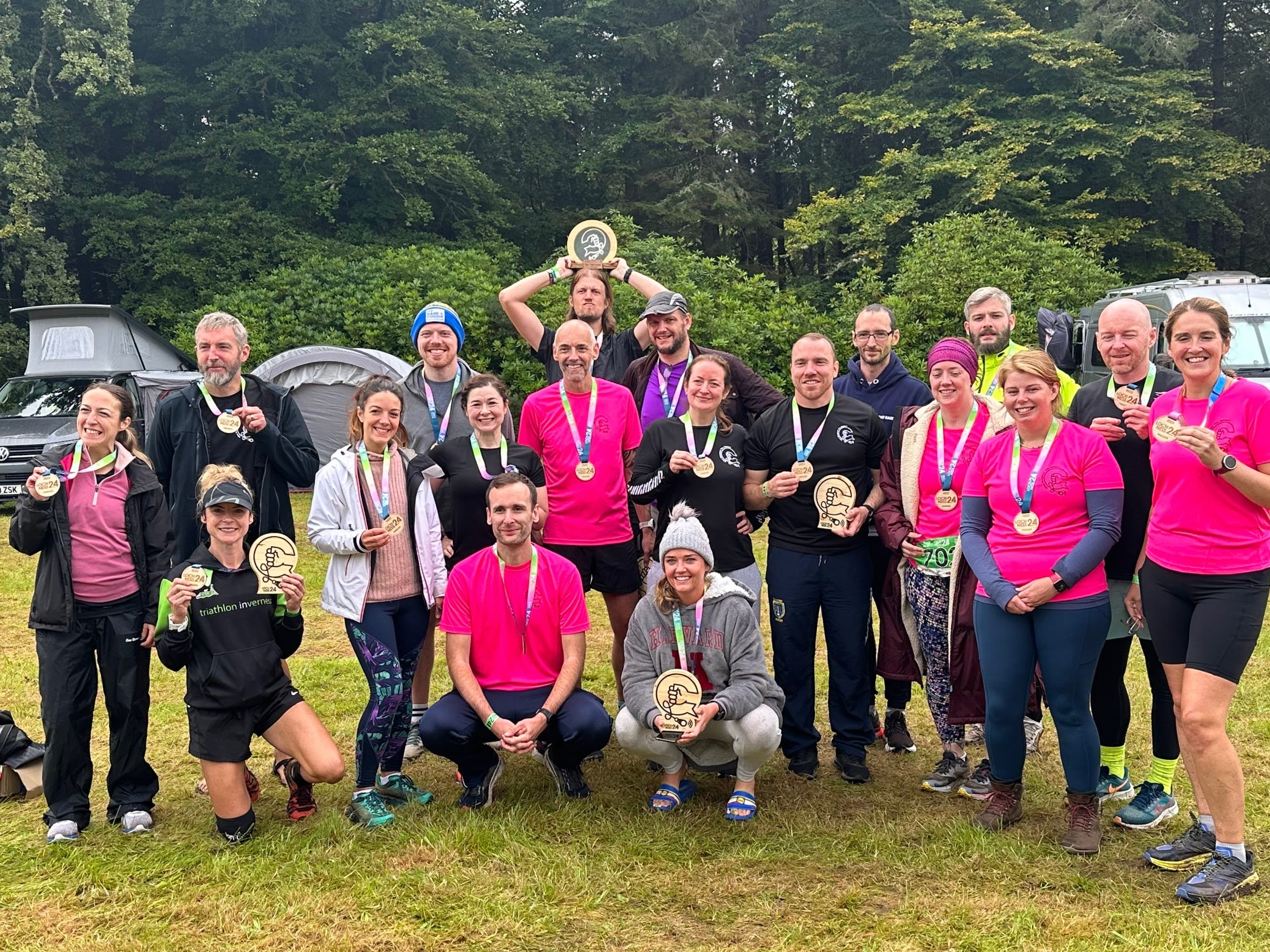 a group of runners with awards after Loch Ness 24