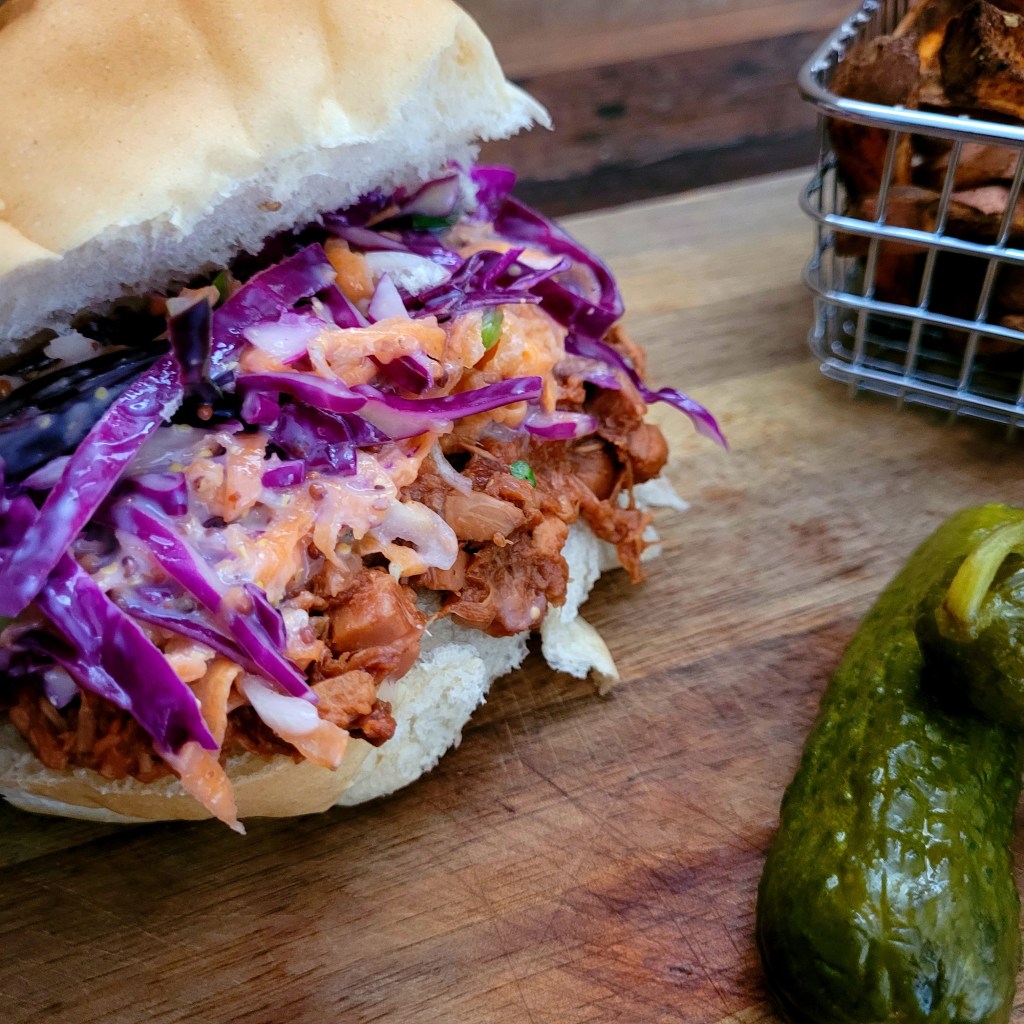 bbq pulled jackfruit burger and coleslaw