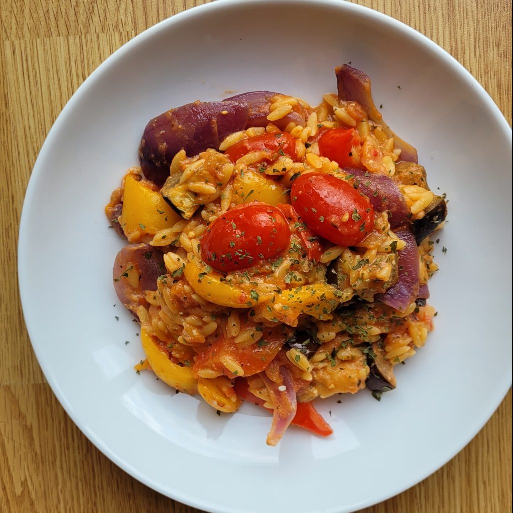 Vegan plant based tomato orzo pasta bake