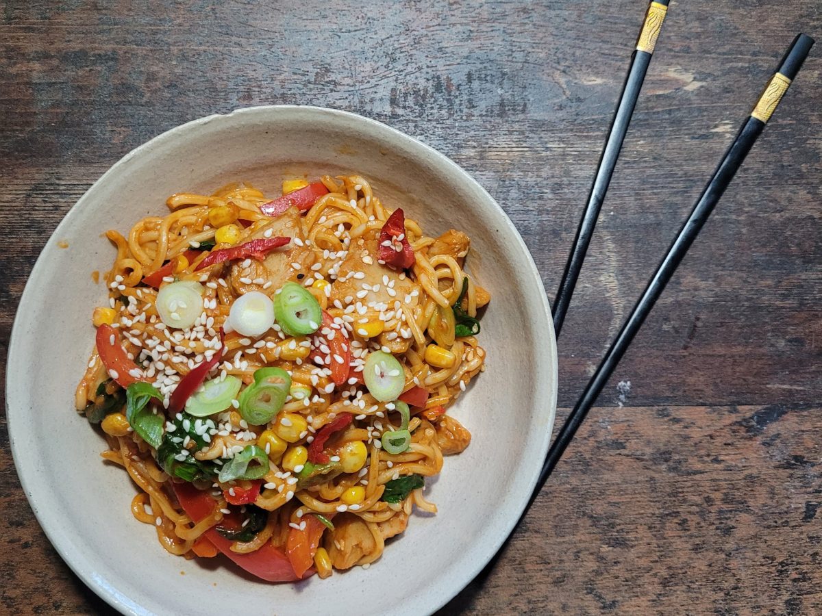 Spicy Serenade: Tomato Sauce Noodles with Sweetcorn, Sesame Seeds, and Spring&nbsp;Onions